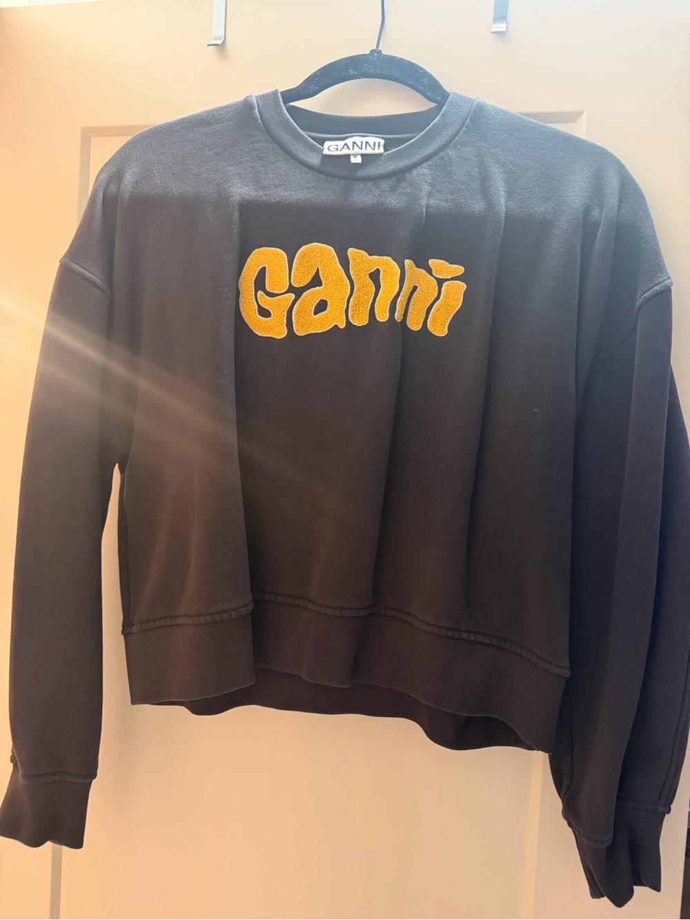 Ganni Black Crewneck with Bold Yellow Logo